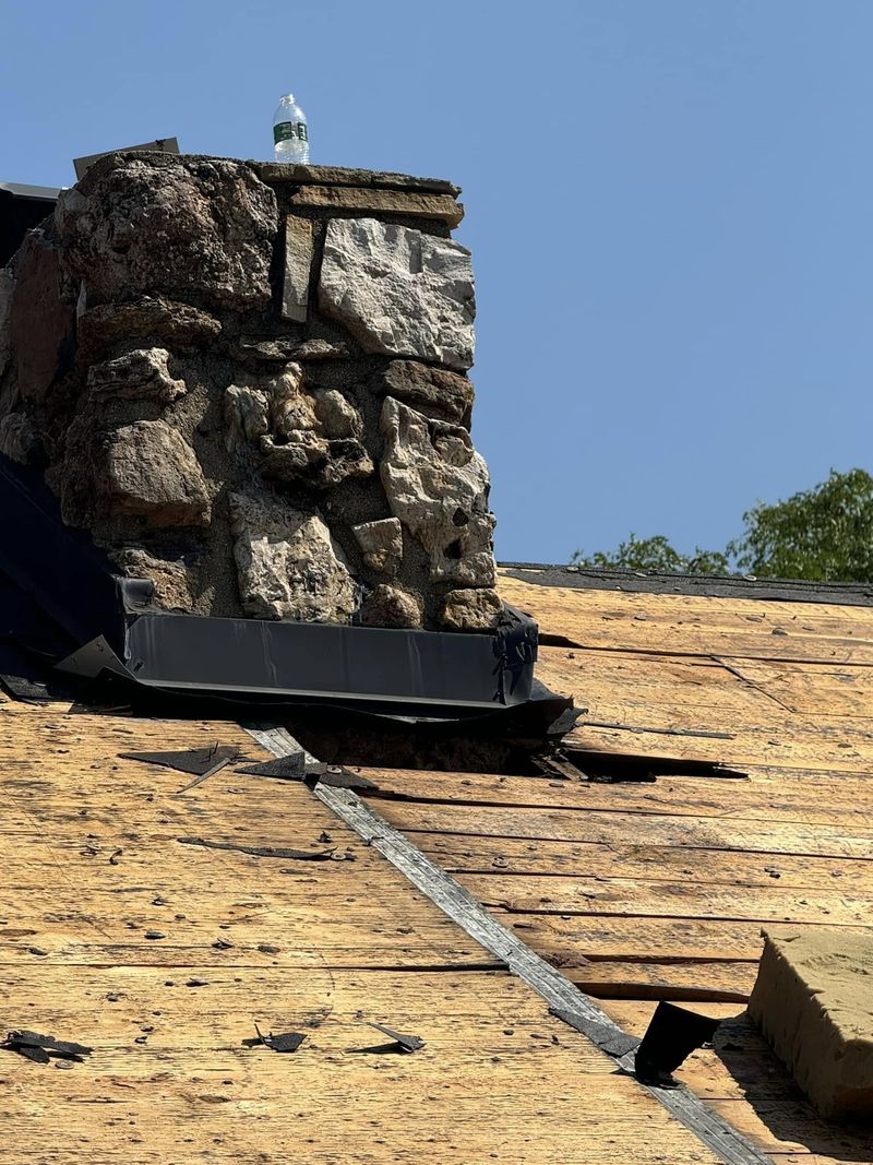 Chimney flashing, decking exposed