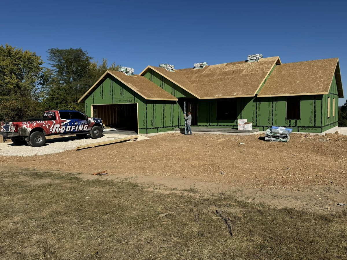 Before — the bare roof decking